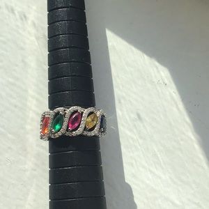 Genuine 925 silver ring plated with colorful genuine stones.